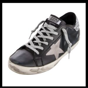Golden Goose Super Star sneakers I purchased them fromThe Real Real!